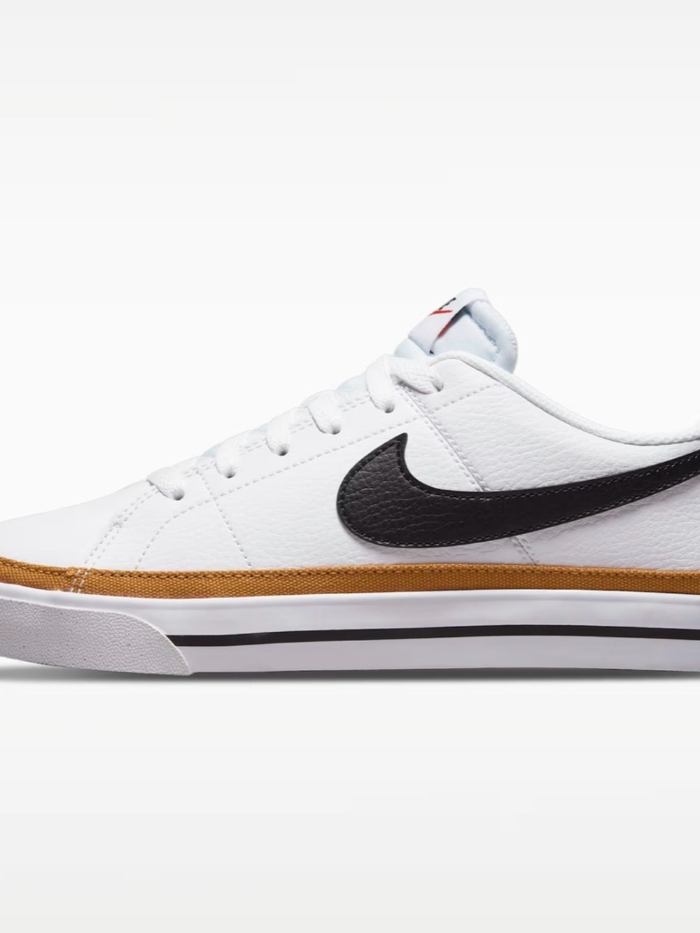 Nike White Leather Low-Top Sneaker with Black Swoosh and Brown Trim